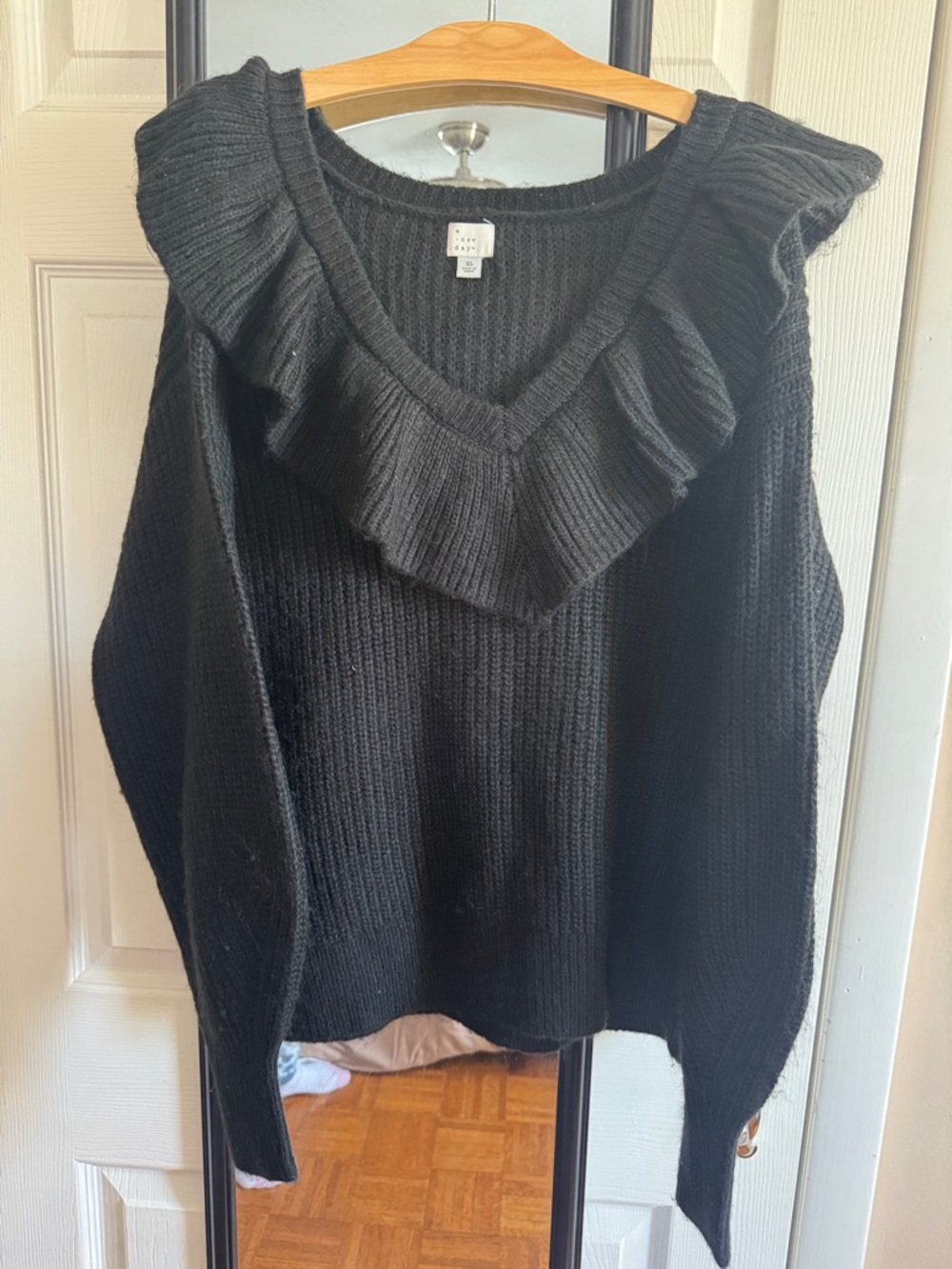 a new day Black V-Neck Ruffle Knit Pullover